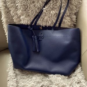 Tori Burch tote, pristine condition. 21”x11.5”x6”. Comes with storage bag